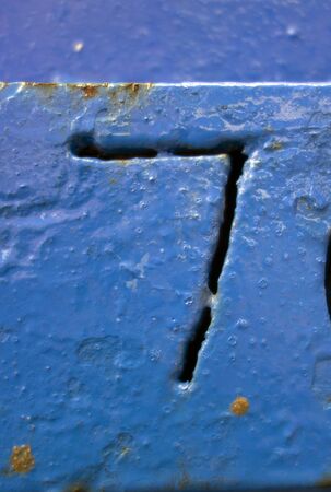 Written Wording in Distressed State Typography Found Number Seven 7