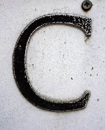 Written Wording in Distressed State Typography Found Letter Cの写真素材