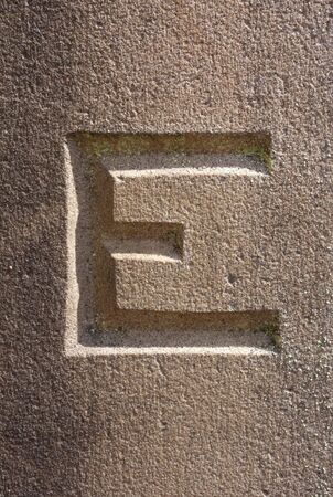 Written Wording in Distressed State Typography Found Letter E