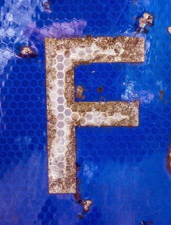 Written Wording in Distressed State Typography Found Letter fの写真素材