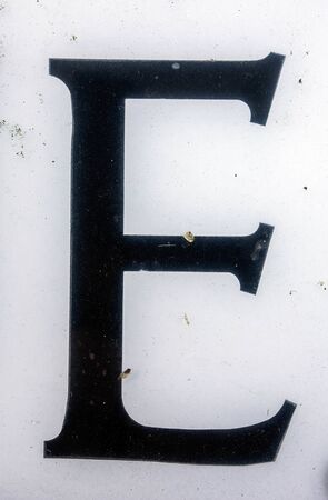 Written Wording in Distressed State Typography Found Letter Eの写真素材