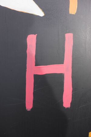 Written Wording in Distressed State Typography Found Letter hの写真素材