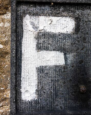 Written Wording in Distressed State Typography Found Letter fの写真素材