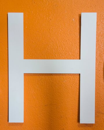 Written Wording in Distressed State Typography Found Letter hの写真素材