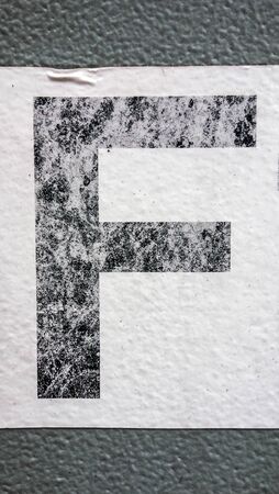 Written Wording in Distressed State Typography Found Letter fの写真素材