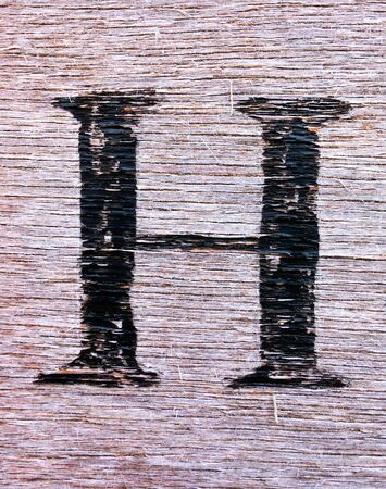 Written Wording in Distressed State Typography Found Letter hの写真素材