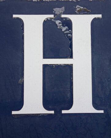 Written Wording in Distressed State Typography Found Letter hの写真素材