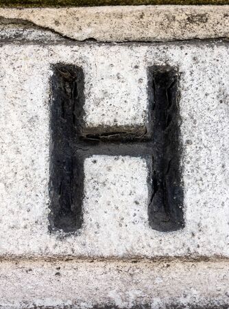 Written Wording in Distressed State Typography Found Letter hの写真素材