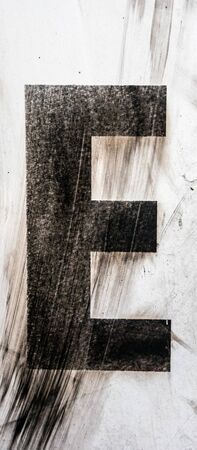Written Wording in Distressed State Typography Found Letter Eの写真素材