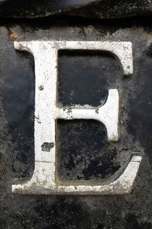 Written Wording in Distressed State Typography Found Letter Eの写真素材