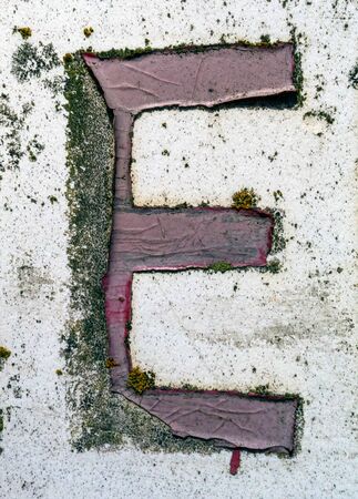 Written Wording in Distressed State Typography Found Letter Eの写真素材