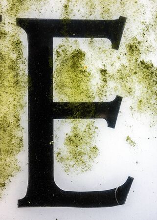 Written Wording in Distressed State Typography Found Letter Eの写真素材