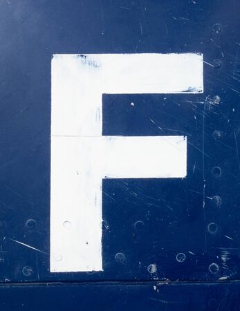 Written Wording in Distressed State Typography Found Letter fの写真素材