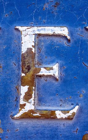 Written Wording in Distressed State Typography Found Letter Eの写真素材