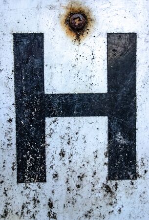 Written Wording in Distressed State Typography Found Letter hの写真素材