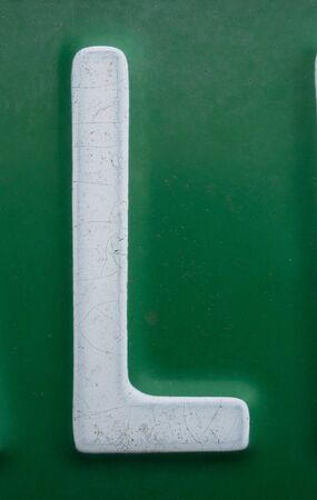 Written Wording in Distressed State Typography Found Letter L