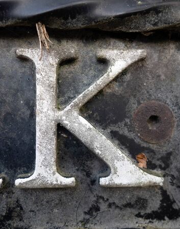 Written Wording in Distressed State Typography Found Letter Kの写真素材