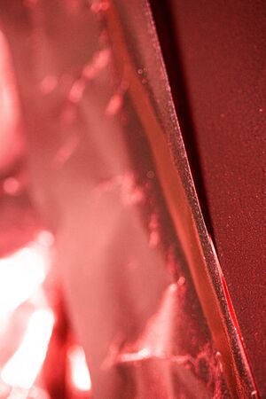 Close Up of Tin Metal Foil Holographic Abstract Backgroundの写真素材