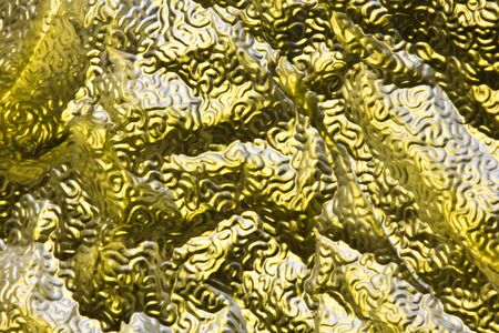 Close Up of Tin Metal Foil Holographic Abstract Background