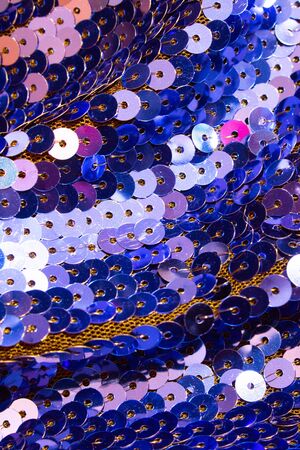 Vibrant Abstract Close Up of Vibrant Glitter Sequins for Backgroundの写真素材