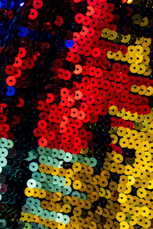 Vibrant Abstract Close Up of Vibrant Glitter Sequins for Backgroundの写真素材