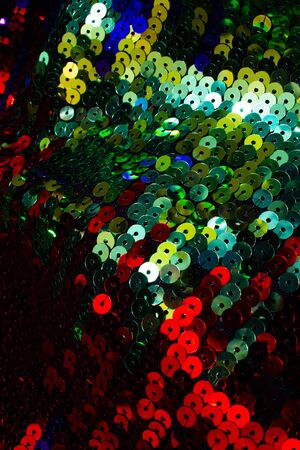 Vibrant Abstract Close Up of Vibrant Glitter Sequins for Backgroundの写真素材