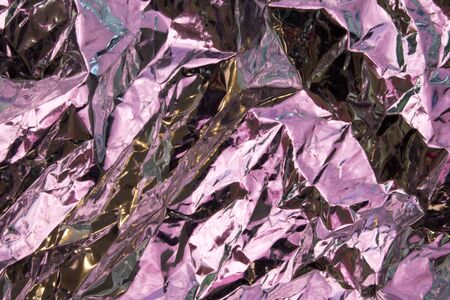 Close Up of Tin Metal Foil Holographic Abstract Backgroundの写真素材
