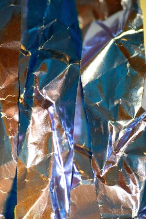 Close Up of Tin Metal Foil Holographic Abstract Background