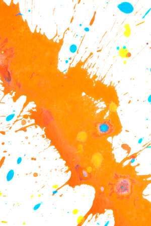 Orange, Blue and Yellow Acrylic Paint Splatters and Lines on White Backgroundの写真素材