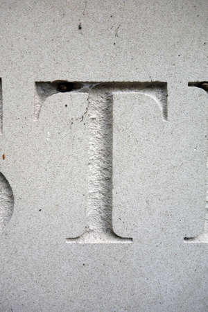 A Written Wording in Distressed State Typography Found Letter t