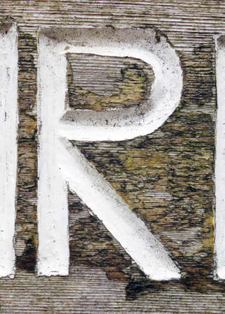 A Written Wording in Distressed State Typography Found Letter rの写真素材