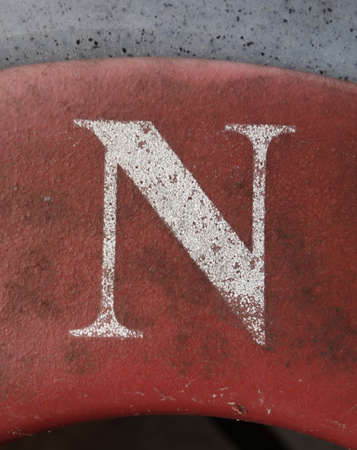 A Written Wording in Distressed State Typography Found Letter n