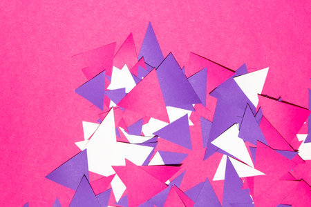 A Pink Purple Geometric Paper Triangle Pieces for Backgroundの写真素材