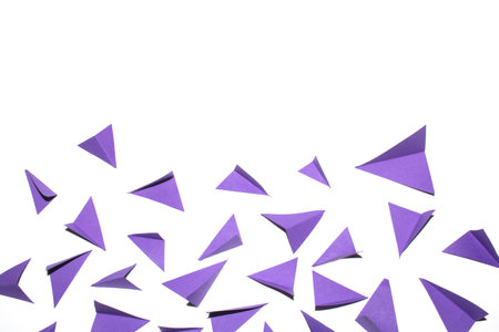 A Pink Purple and White Geometric Folded Paper Triangle Shapes for Background Craft