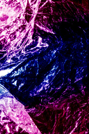 colorful crumpled foil texture. abstract background and texture for design.の写真素材