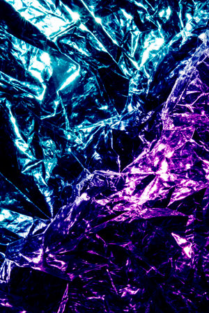texture of crumpled shiny foil as background, close-upの写真素材