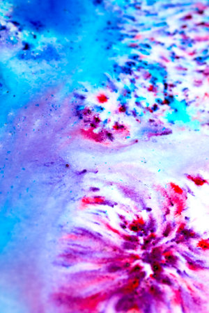 A Vibrant Paint Powder and Splashes in Watercolour Painting Exploding Colour Rainbowsの写真素材
