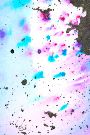 A Black Ink Splatters and Spill on A Vibrant Rainbow Colour Watercolor Background Abstrct Paint