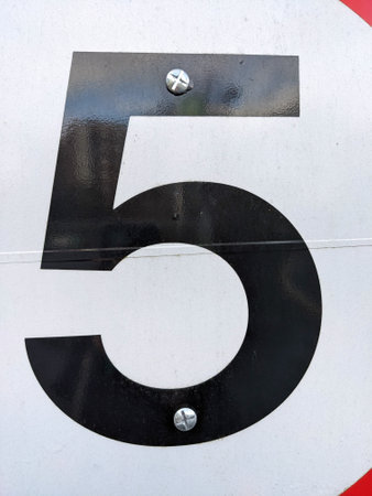 A Written Wording in Distressed State Typography Found Number Letter