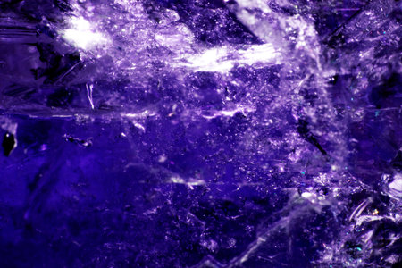 Close Up of a Rock Crystal with inclusions in Putple blue Rainbowの写真素材