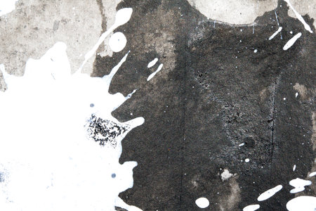 Thick Black and White Ink and Paint Splatters and Lines Abstract Backgroundの写真素材