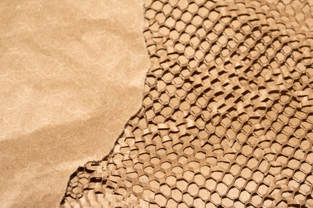 Cardboard Paper Screwed Crunched up Box Packaging with Honeycomb Pattern Close up for Backgroundの写真素材