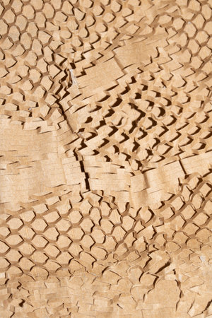 Cardboard Paper Screwed Crunched up Box Packaging with Honeycomb Pattern Close up for Backgroundの写真素材