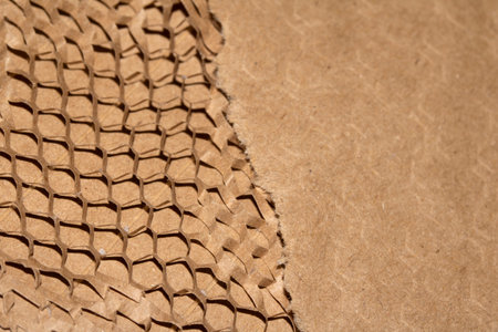 Cardboard Paper Screwed Crunched up Box Packaging with Honeycomb Pattern Close up for Backgroundの写真素材
