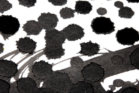 Black Messy Creative Ink Splatters Blots and Blobs  and Inkblot Close Up on White Background