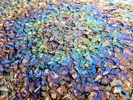 Oil Petrol Pollution Rainbow Gasoline Leak on Pavement
