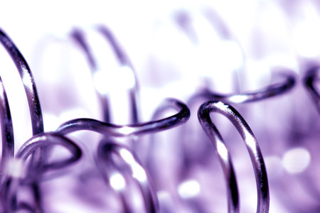 Abstract Close up of Metal Coil Spring Spiral Industrial Blue Backgroundの写真素材