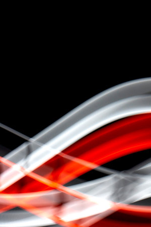Neon Red and White Light on Black Background Abstract Lines Swirls and Wavesの写真素材