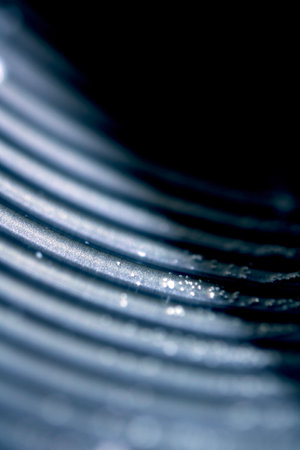 Abstract Geometric Metal Lines Swirl Industrial and Electronic Technology Backgroundの写真素材