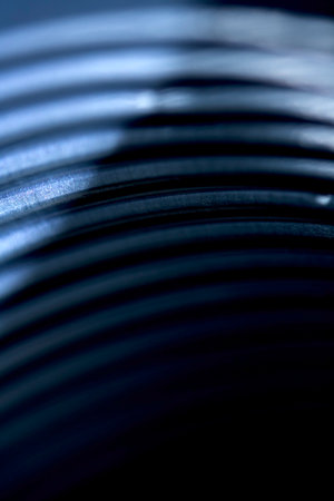 Abstract Geometric Metal Lines Swirl Industrial and Electronic Technology Backgroundの写真素材